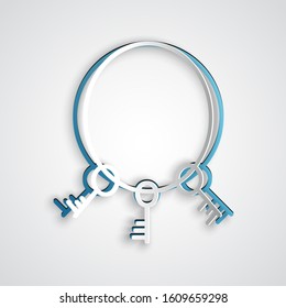 Paper cut Old keys icon isolated on grey background. Paper art style. Vector Illustration