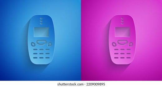 Paper Cut Old Vintage Keypad Mobile Phone Icon Isolated On Blue And Purple Background. Retro Cellphone Device. Vintage 90s Mobile Phone. Paper Art Style. Vector