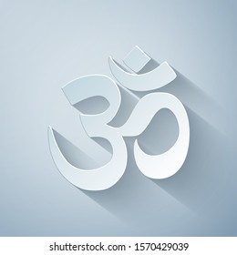 Paper cut Om or Aum Indian sacred sound icon isolated on grey background. Symbol of Buddhism and Hinduism religions. The symbol of the divine triad of Brahma, Vishnu and Shiva. Vector Illustration