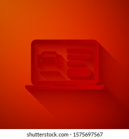 Paper cut Online car sharing icon isolated on red background. Online rental car service. Online booking design concept for laptop. Paper art style. Vector Illustration