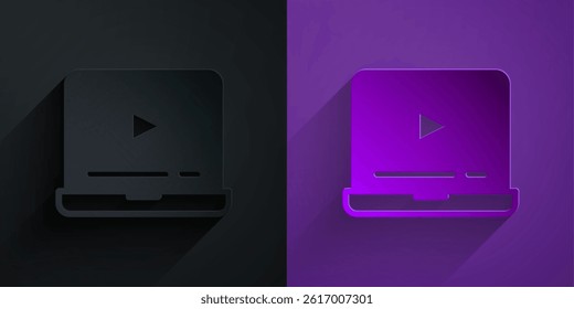 Paper cut Online play video icon isolated on black on purple background. Laptop and film strip with play sign. Paper art style. Vector