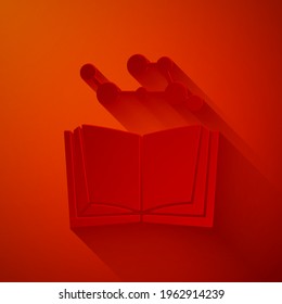 Paper cut Open book icon isolated on red background. Paper art style. Vector Illustration