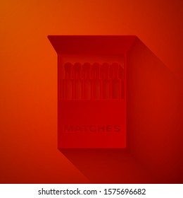 Paper cut Open matchbox and matches icon isolated on red background. Paper art style. Vector Illustration