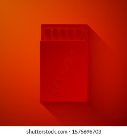 Paper cut Open matchbox and matches icon isolated on red background. Paper art style. Vector Illustration