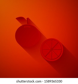 Paper cut Orange fruit icon isolated on red background. Paper art style. Vector Illustration