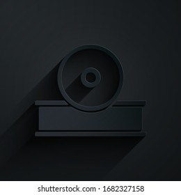 Paper cut Otolaryngological head reflector icon isolated on black background. Equipment for inspection the patient's ear, throat and nose. Paper art style. Vector Illustration