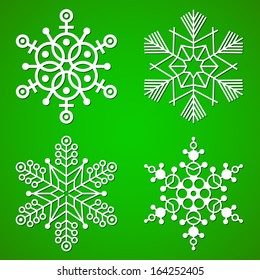 Paper cut out snowflakes set