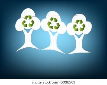 Paper cut out trees with recycling symbol on a blue background EPS10