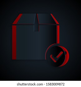 Paper cut Package box with check mark icon isolated on black background. Parcel box with checkmark. Approved delivery or successful package receipt. Paper art style. Vector Illustration