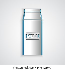 Paper cut Paper package for milk icon isolated on grey background. Milk packet sign. Paper art style. Vector Illustration