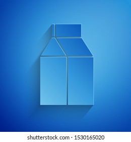 Paper cut Paper package for milk icon isolated on blue background. Milk packet sign. Paper art style. Vector Illustration