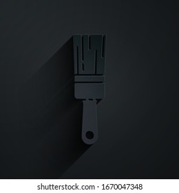 Paper cut Paint brush icon isolated on black background. Paper art style. Vector Illustration