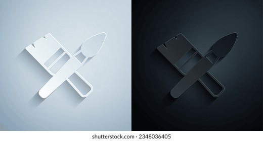 Paper cut Paint brush icon isolated on grey and black background. Paper art style. Vector