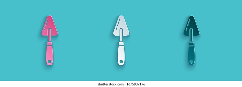 Paper cut Palette knife icon isolated on blue background. Paper art style. Vector Illustration