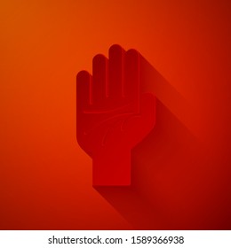 Paper cut Palmistry of the hand icon isolated on red background. Paper art style. Vector Illustration