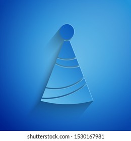 Paper cut Party hat icon isolated on blue background. Birthday hat. Paper art style. Vector Illustration
