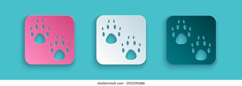 Paper cut Paw print icon isolated on blue background. Dog or cat paw print. Animal track. Paper art style. Vector