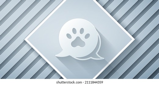 Paper cut Paw print icon isolated on grey background. Dog or cat paw print. Animal track. Paper art style. Vector