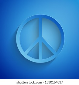 Paper cut Peace icon isolated on blue background. Hippie symbol of peace. Paper art style. Vector Illustration