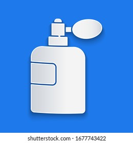 Paper cut Perfume icon isolated on blue background. Paper art style. Vector Illustration