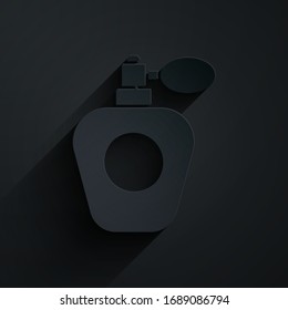 Icono de corte de papel Perfume aislado en fondo negro. Estilo de arte de papel. Ilustración vectorial