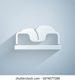 Paper cut Pet bed icon isolated on grey background. Paper art style. Vector