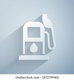Paper cut Petrol or gas station icon isolated on grey background. Car fuel symbol. Gasoline pump. Paper art style. Vector