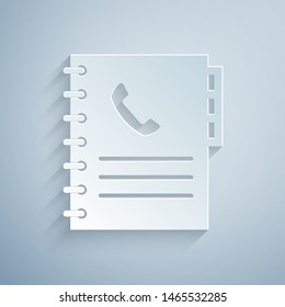 Paper cut Phone book icon isolated on grey background. Address book. Telephone directory. Paper art style. Vector Illustration