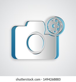 Paper cut Photo camera and gear icon isolated on grey background. Adjusting app, service concept, setting options, maintenance, repair, fixing. Paper art style. Vector Illustration