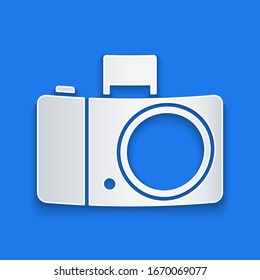 Paper cut Photo camera icon isolated on blue background. Foto camera icon. Paper art style. Vector Illustration