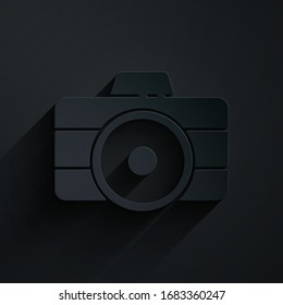 Paper cut Photo camera icon isolated on black background. Foto camera icon. Paper art style. Vector Illustration