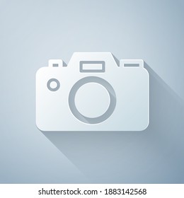 Paper cut Photo camera icon isolated on grey background. Foto camera icon. Paper art style. Vector