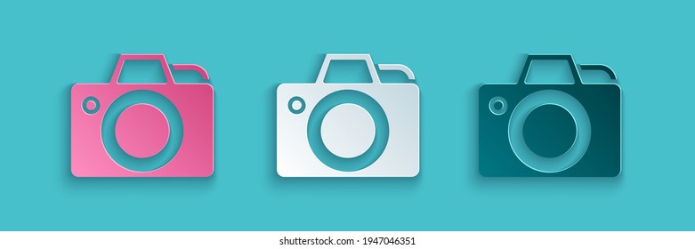 Paper cut Photo camera icon isolated on blue background. Foto camera icon. Paper art style. Vector