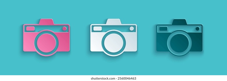 Paper cut Photo camera icon isolated on blue background. Foto camera icon. Paper art style. Vector