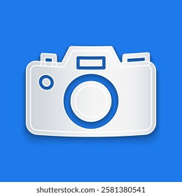 Paper cut Photo camera icon isolated on blue background. Foto camera icon. Paper art style. Vector