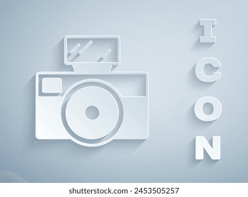 Paper cut Photo camera with lighting flash icon isolated on grey background. Foto camera. Digital photography. Paper art style. Vector