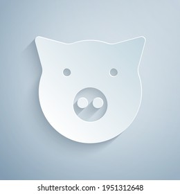 Paper cut Pig icon isolated on grey background. Animal symbol. Paper art style. Vector