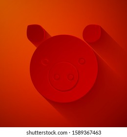 Paper cut Pig zodiac sign icon isolated on red background. Astrological horoscope collection. Paper art style. Vector Illustration