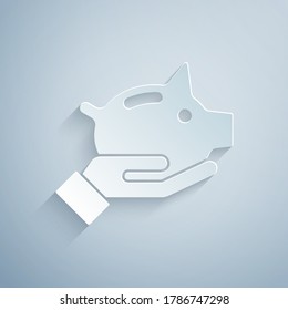 Paper cut Piggy bank icon isolated on grey background. Icon saving or accumulation of money, investment. Paper art style. Vector.