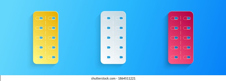 Paper cut Pills in blister pack icon isolated on blue background. Medical drug package for tablet: vitamin, antibiotic, aspirin. Paper art style. Vector.