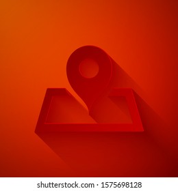 Paper cut Placeholder on map paper in perspective icon isolated on red background. Paper art style. Vector Illustration