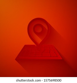 Paper cut Placeholder on map paper in perspective icon isolated on red background. Paper art style. Vector Illustration