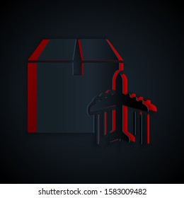 Paper cut Plane and cardboard box icon isolated on black background. Delivery, transportation. Cargo delivery by air. Airplane with parcels, boxes. Paper art style. Vector Illustration