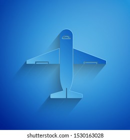 Paper cut Plane icon isolated on blue background. Delivery, transportation. Cargo delivery by air. Airplane with parcels, boxes. Paper art style. Vector Illustration
