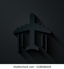 Paper cut Plane icon isolated on black background. Flying airplane icon. Airliner sign. Paper art style. Vector Illustration