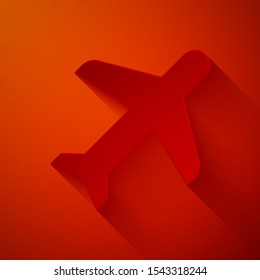 Paper cut Plane icon isolated on red background. Flying airplane icon. Airliner sign. Paper art style. Vector Illustration