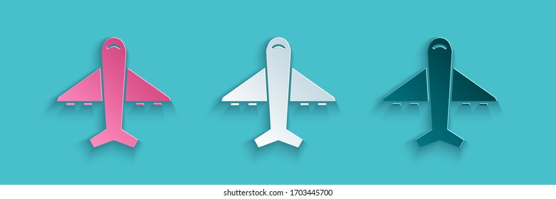 Paper cut Plane icon isolated on blue background. Flying airplane icon. Airliner sign. Paper art style. Vector Illustration