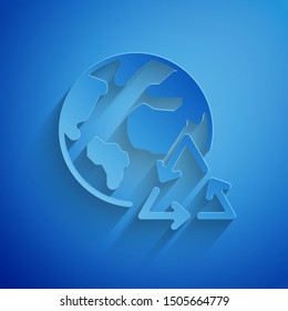 Paper cut Planet earth and a recycling icon isolated on blue background. Environmental concept. Paper art style. Vector Illustration