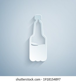 Paper cut Plastic beer bottle icon isolated on grey background. Paper art style. Vector.