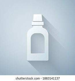 Paper cut Plastic bottle for laundry detergent, bleach, dishwashing liquid or another cleaning agent icon isolated on grey background. Paper art style. Vector